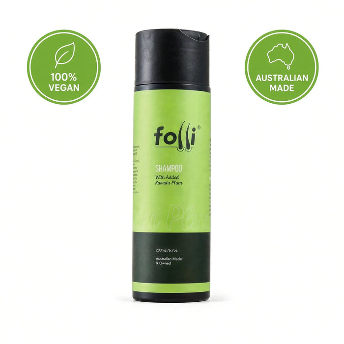 Hair Folli Shampoo with Kakadu Plum in a green and black bottle, with 100% Vegan, Australian Made and Kakadu Plum badges.