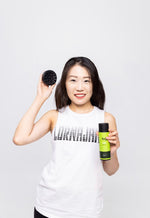 Woman holding growth applicator | folli products